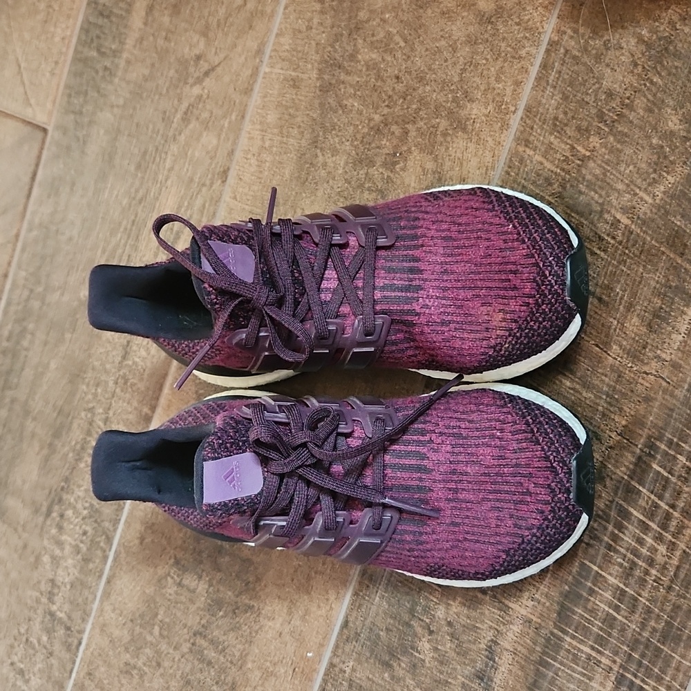 Adidas Ultra Boost sneakers cranberry/maroon in color